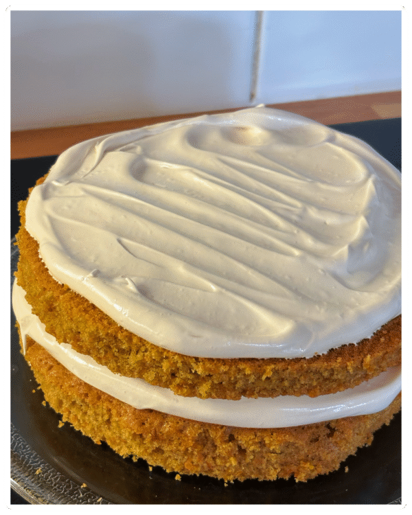 Freshly baked carrot cake, moist and golden with cream cheese frosting — homemade with love by MumsFavouriteBakes